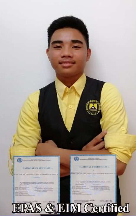 A student cross his arm with certificates